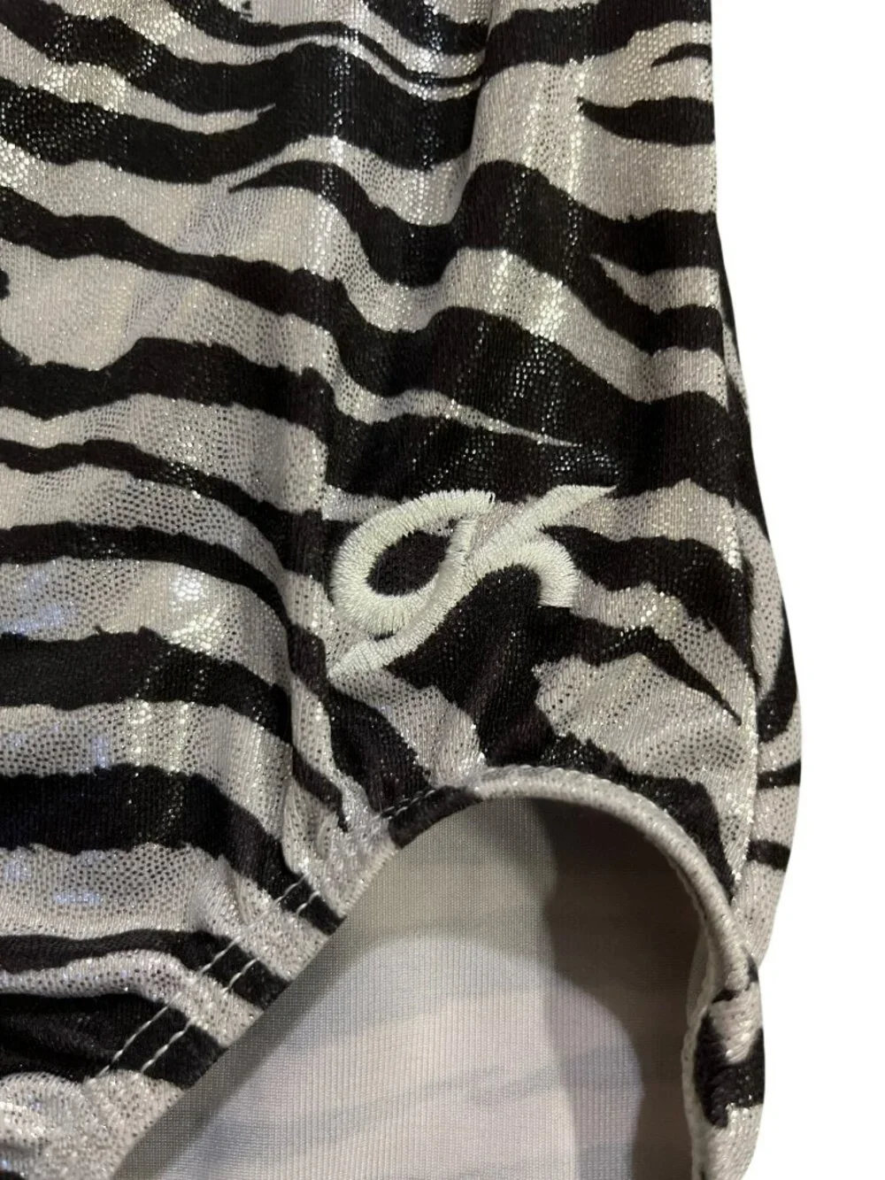 GK Elite Zebra Print Metallic Gymnastics Leotard Girls M (CM) Used Sleeveless